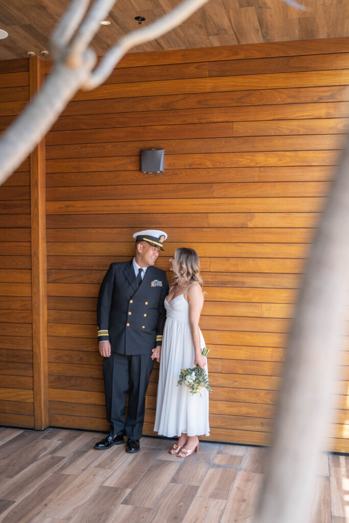 Couple at Ketch Brewing at San Diego harbor after their elopement.