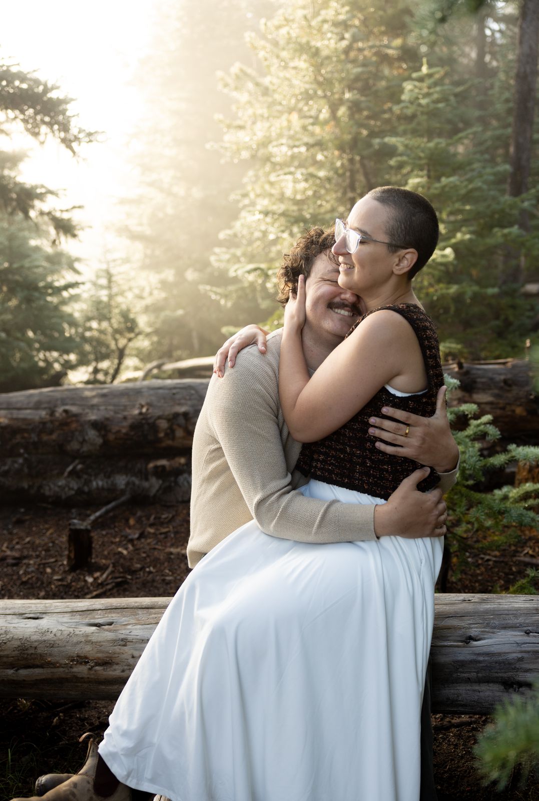 Warm morning light through the pines at a Central Oregon engagement session